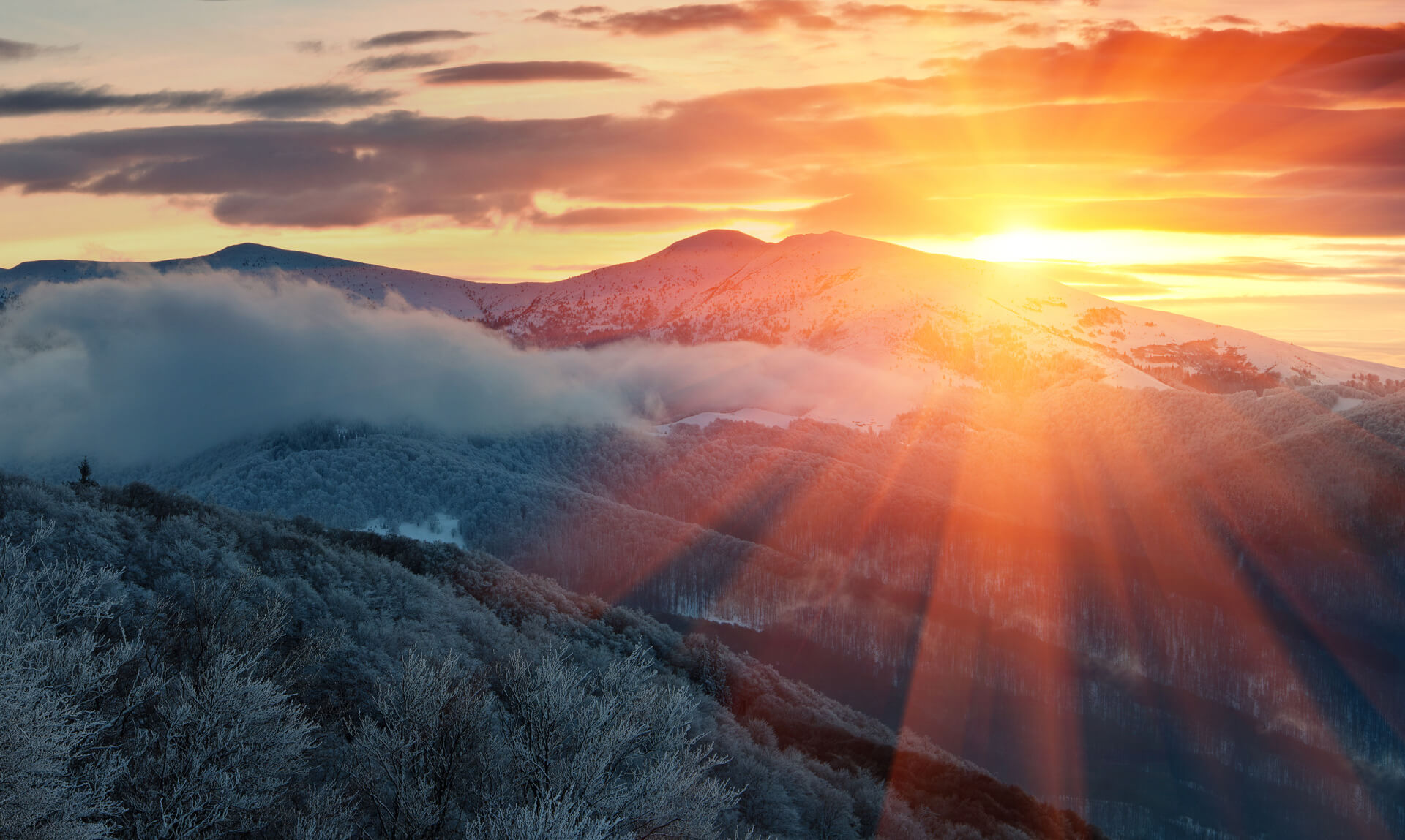 Sunset over a snowy mountain